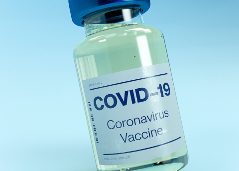 Small vial labeled Corornavirus Vaccine