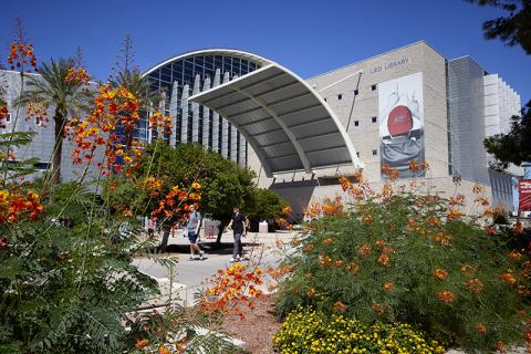 Students walk in front of Lied Library