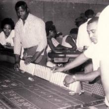 Three patrons at the craps table in the El Rio Club on the Westside, circa 1960s.