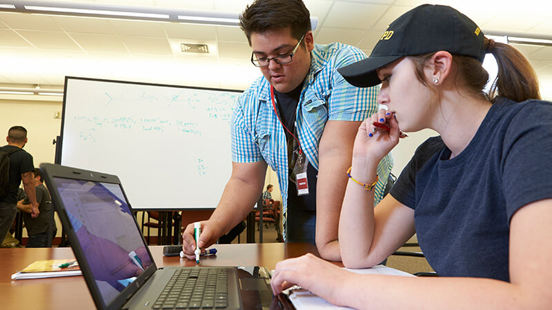 Student working at laptop