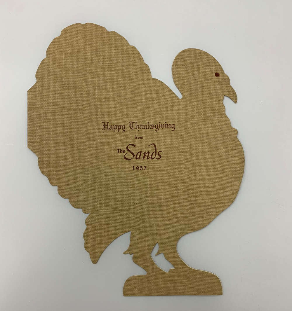 Light brown menu in shape of turkey from the Sands