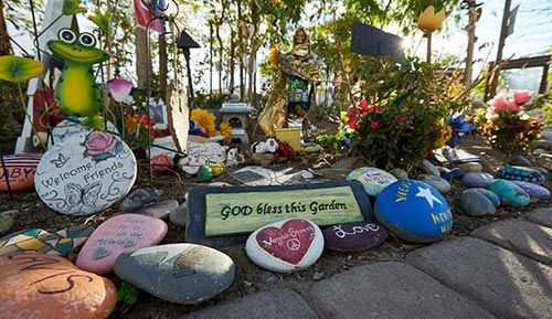 Photograph of painted stones at the Community Healing Garden (PH-00433)