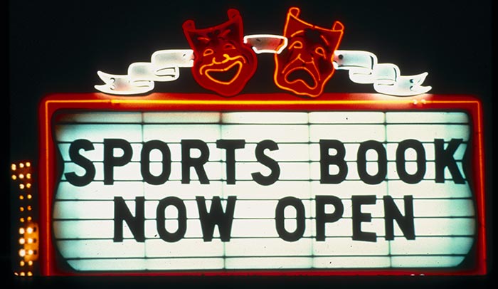 Photograph of Las Vegas Sports Book Now Open sign