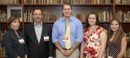 Group photo of Lance and Elena Calvert standing with 2008 award winners.