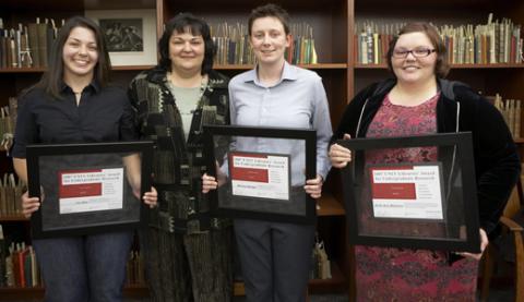 Lisa Rios, Dean of Libraries with award winners Patricia Iannuzzi, Melissa Mezger and Heidi Ann Manlove at the 2007 Award Reception. 