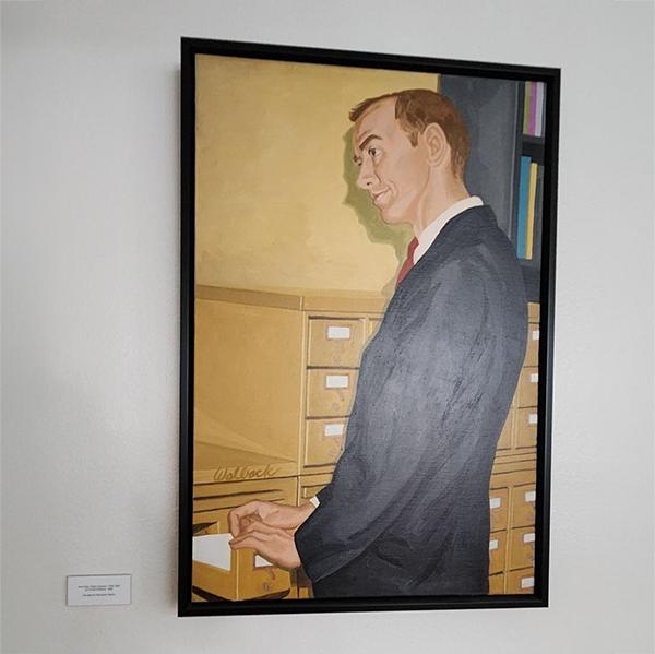 Painting of a main in a suit flipping through a card catalog. 