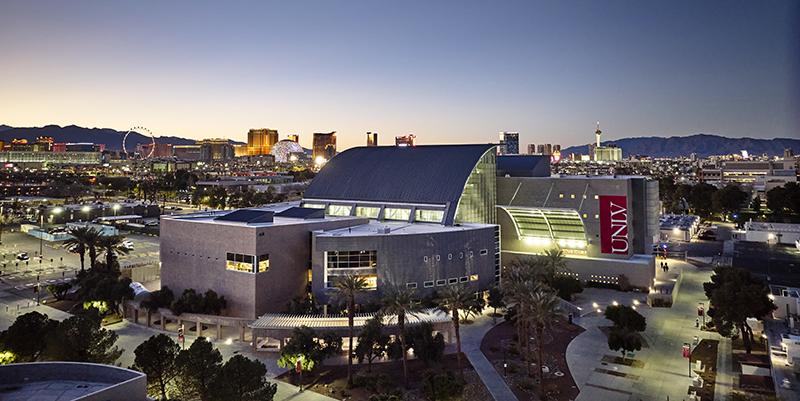 Exterior image of Lied Library with the Las Vegas Strip in the background.