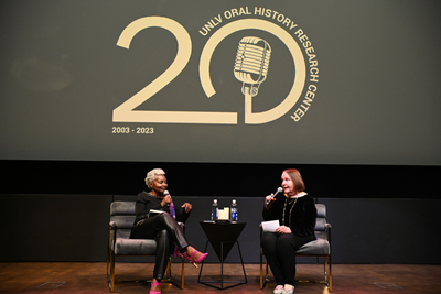 Stefani Evans interviewing Claytee White on stage at the Beverly Theater. 