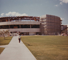 Color photo showing construction of the second and third floor additions to the NSU Library