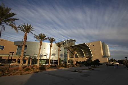 Exterior of Lied Library showing blue sky and palms trees