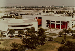 Color exterior photo of the expanded James R. Dickinson Library