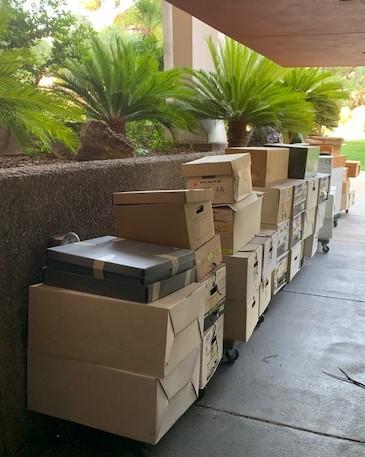  A fraction of the boxes ready to be loaded by professional movers and taken to the third floor of Lied Library. 