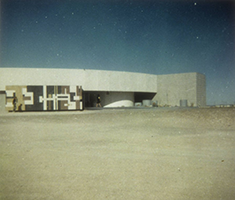 Color exterior photo of Nevada State University Library shortly after completion