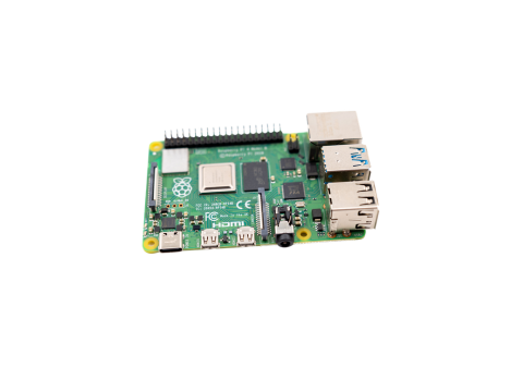 A green circuit board with black pin headers and silver usb type-b ports.