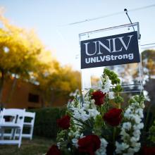 A podium with the UNLV Strong sign on the front. 