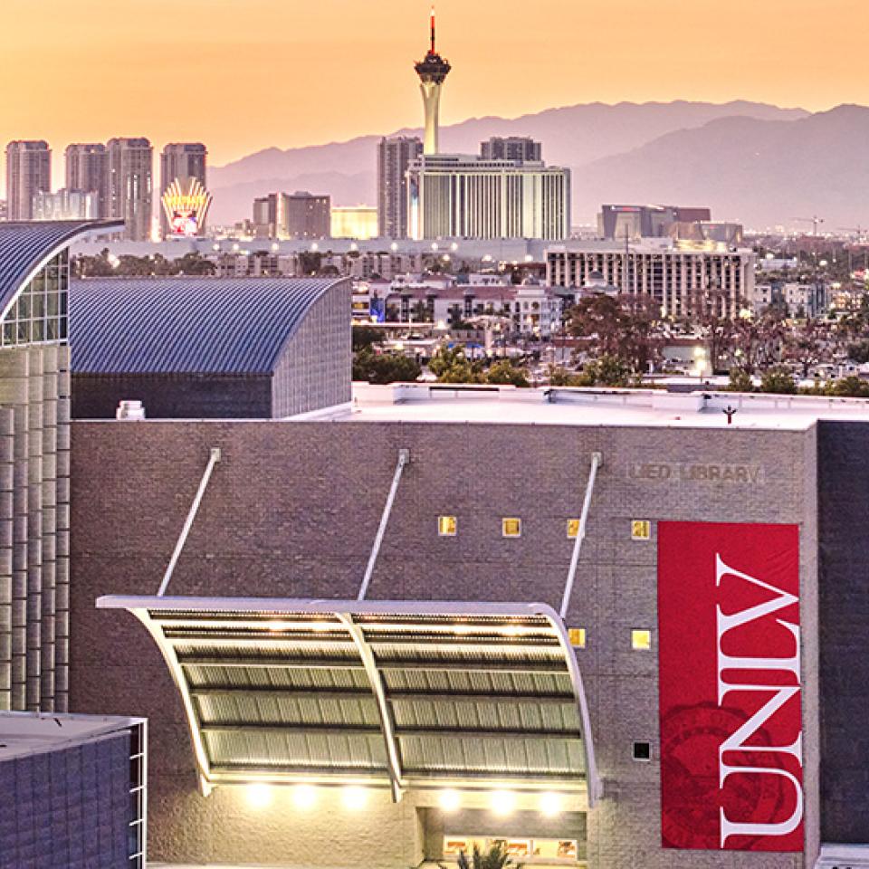 The roof of Lied Library with the Las Vegas skyline in the background.