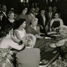 Female gamblers at the roulette table, Sands Hotel and Casino circa late 1950s-early 1960s.